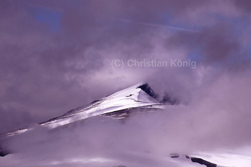 All the day the summit of Glittertinden was hidden by clouds and then for a short moment they vanished.