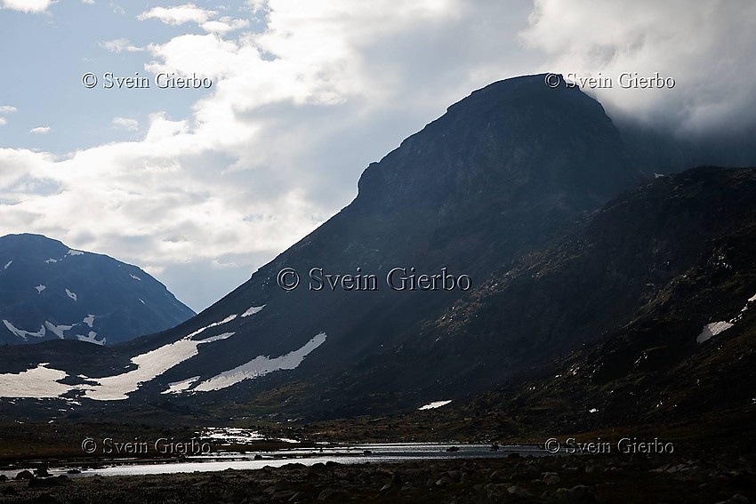 In Trollsteinkvelven valley with Søre Trollsteinhøe and Svartholshøe (left). Jotunheimen National Park. Norway.