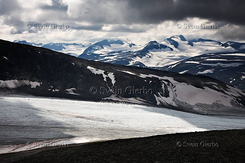 Galdhøpiggen (right), Norways highest mountain as seen from Trollstein-Rundhøe. Jotunheimen National Park. Norway.