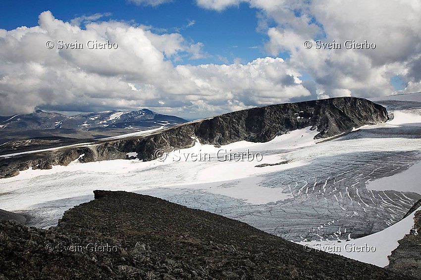 
Grotbrean glacier with Austre Glittertindoksle behind as seen from Trollstein-Rundhøe. Nautgardstindene in the distance. Jotunheimen National Park. Norway.