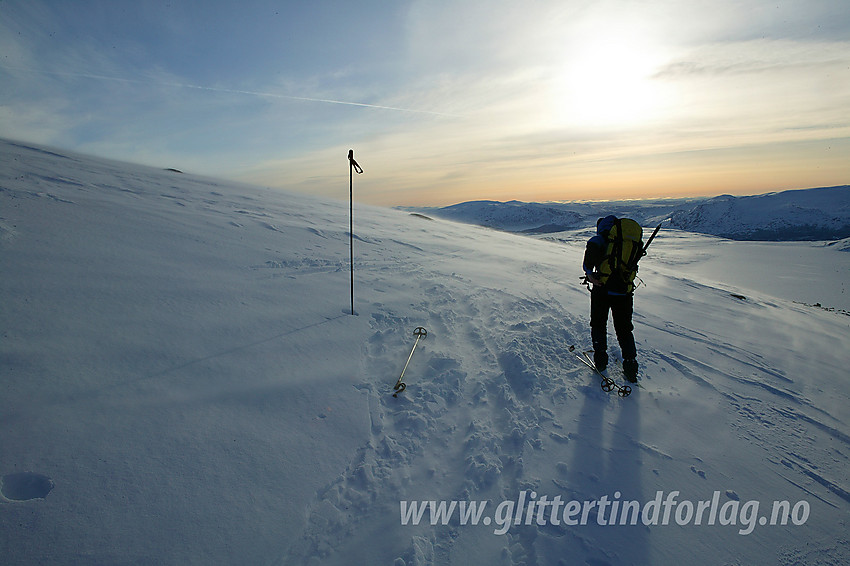 Pause på retur fra Besshøe. I bakgrunnen ses bl.a. Bessvatnet.